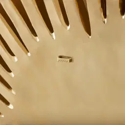 Gold palm leaf wall plaque 