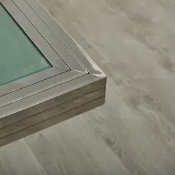 Titus Stainless Steel Dining Table - Smoke Green Glass Top