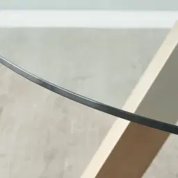 Jutta Glass 120cm Dining Table - Antique Brass Colour Legs