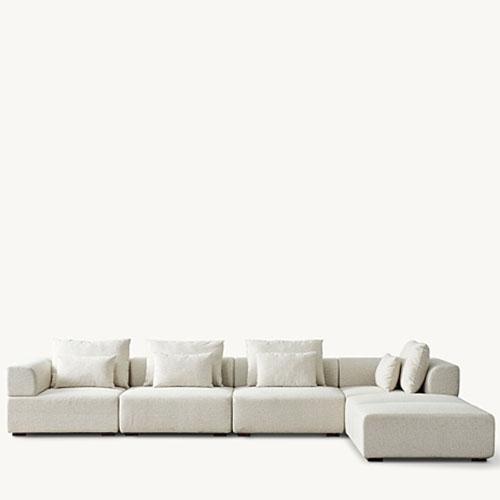 Isabelline White Fabric Modular Sofa with wooden legs, featuring 4 separate seats and 2 ottomans that can be configured separately, includes 8 cushions.
