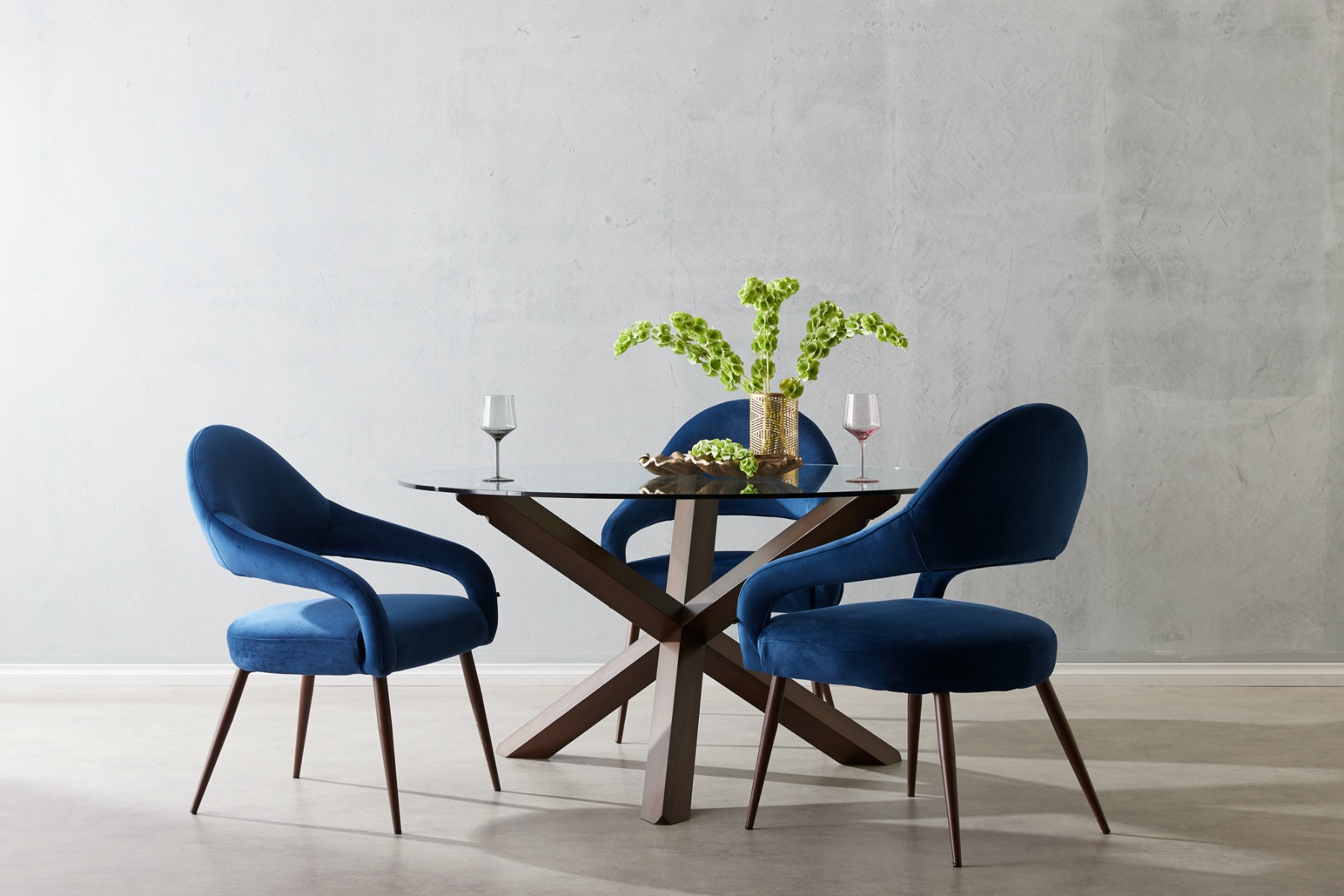 wooden dining table and blue chairs